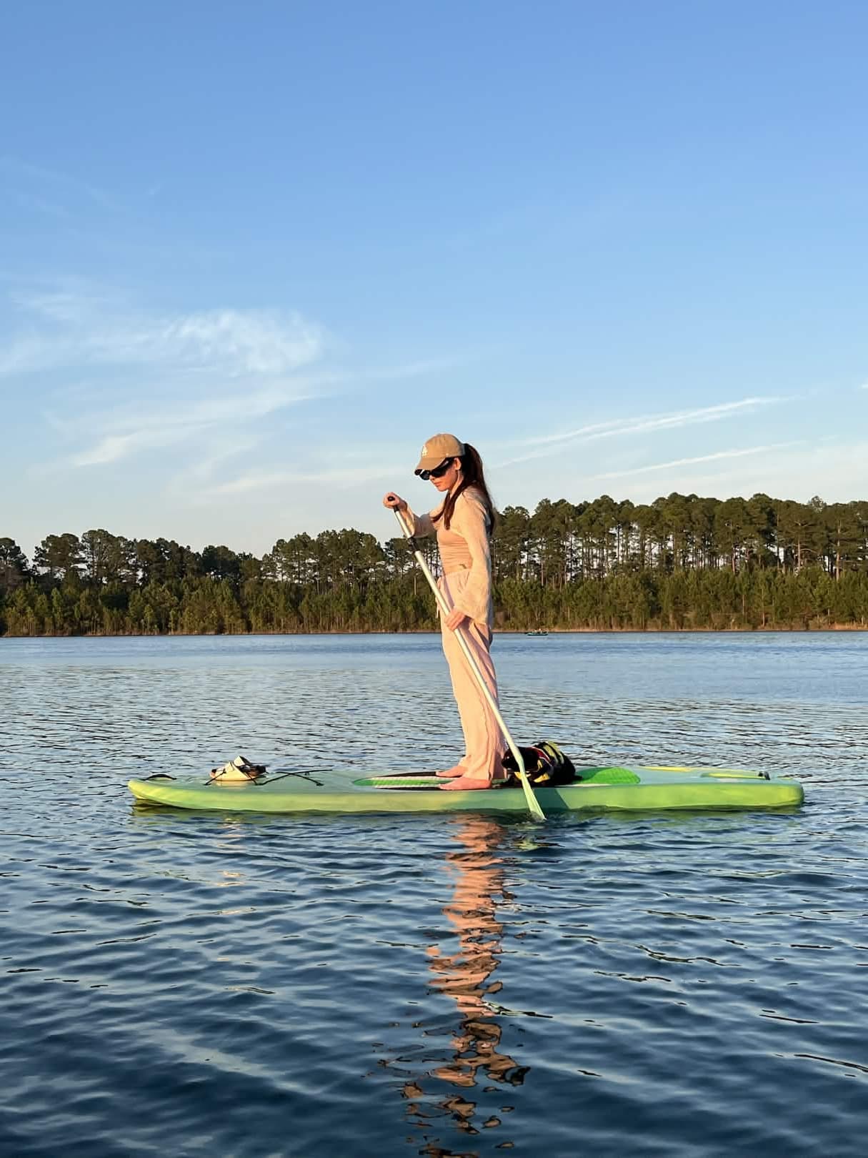 Ambassador sharing a paddle session with their cat